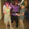 THE ONE WITH THE PURPLE HAIR IS TINKERBELL, CAPTAIN HOOK IS RIGHT BESIDE HER LOOKING FIERCE WHILE PETER PAN TRIES TO STAY OUT OF MISCHIEF.   THEY JUST DROPPED IN TO SAY HELLO TO THE DANCERS!